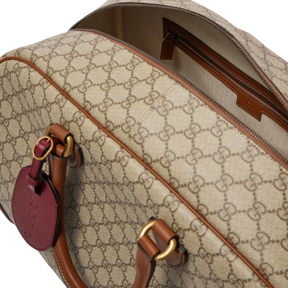 Gucci GG Canvas Medium Leather – Trimmed Duffel Bag