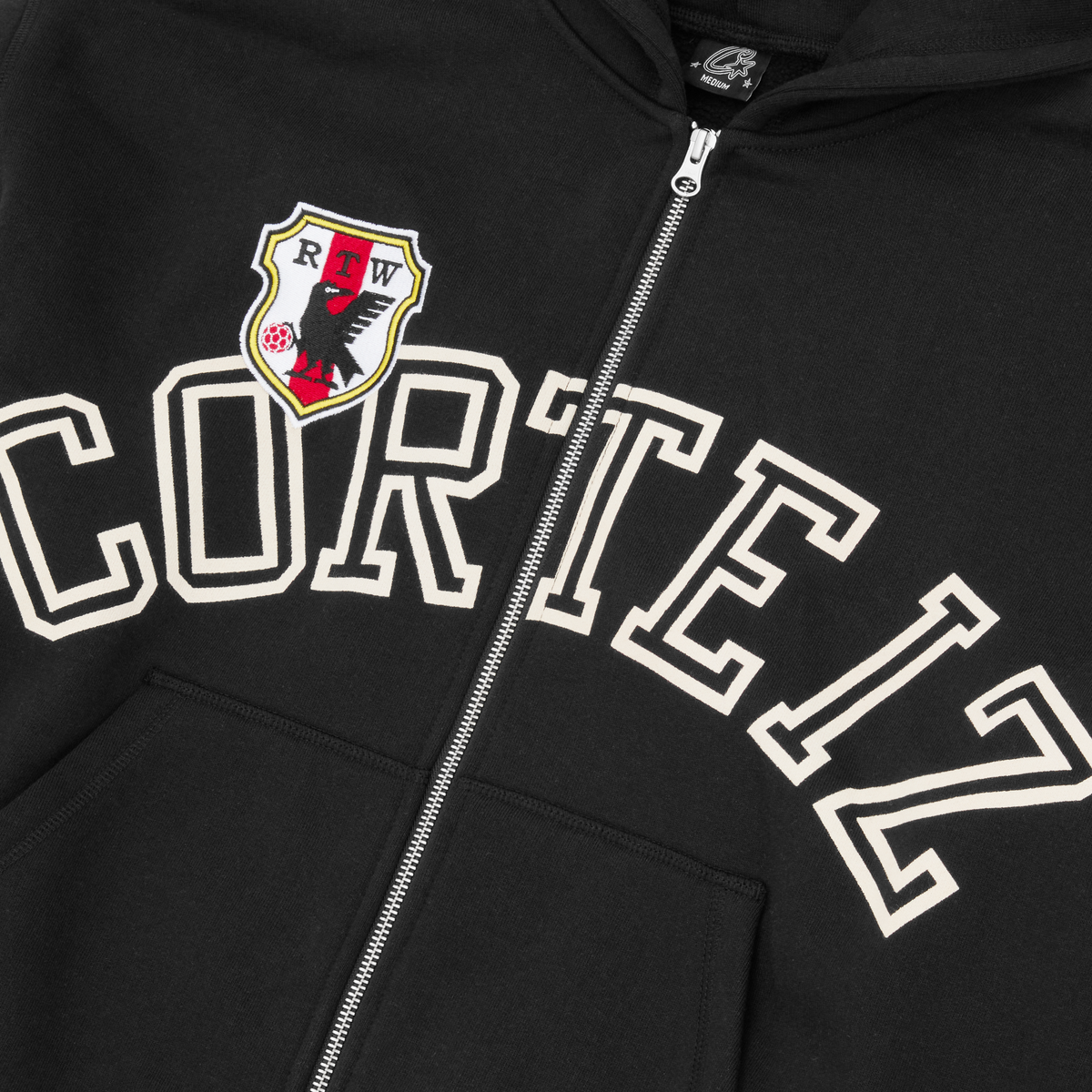 Corteiz Arch Shield Zip Hoodie - Black