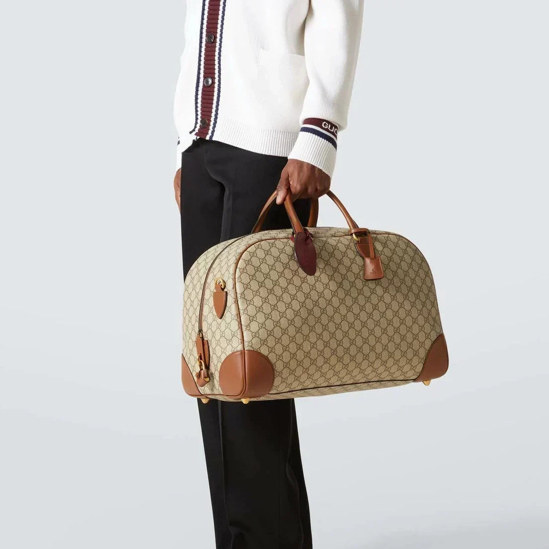 Gucci GG Canvas Medium Leather – Trimmed Duffel Bag