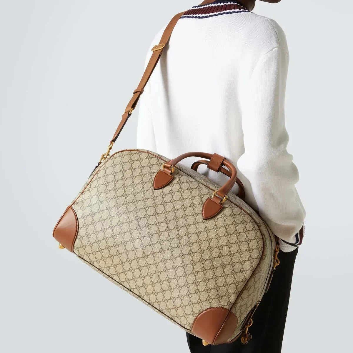 Gucci GG Canvas Medium Leather – Trimmed Duffel Bag